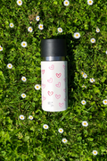 IRISgo cup flow 500ml Herz Design im Gras – verspieltes Design für den Sommer