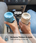 Zwei IRISgo® cup drop 200ml Thermobecher mit Rush Lid 2 im Auto für sicheres Trinken unterwegs