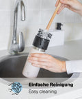 IRISgo Thermobecher wird unter fliessendem Wasser gereinigt - einfache Reinigung ohne Demontage