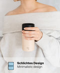 IRISgo® cup sip 350ml Thermobecher in vanilla cream in der Hand, schlichtes minimalistisches Design